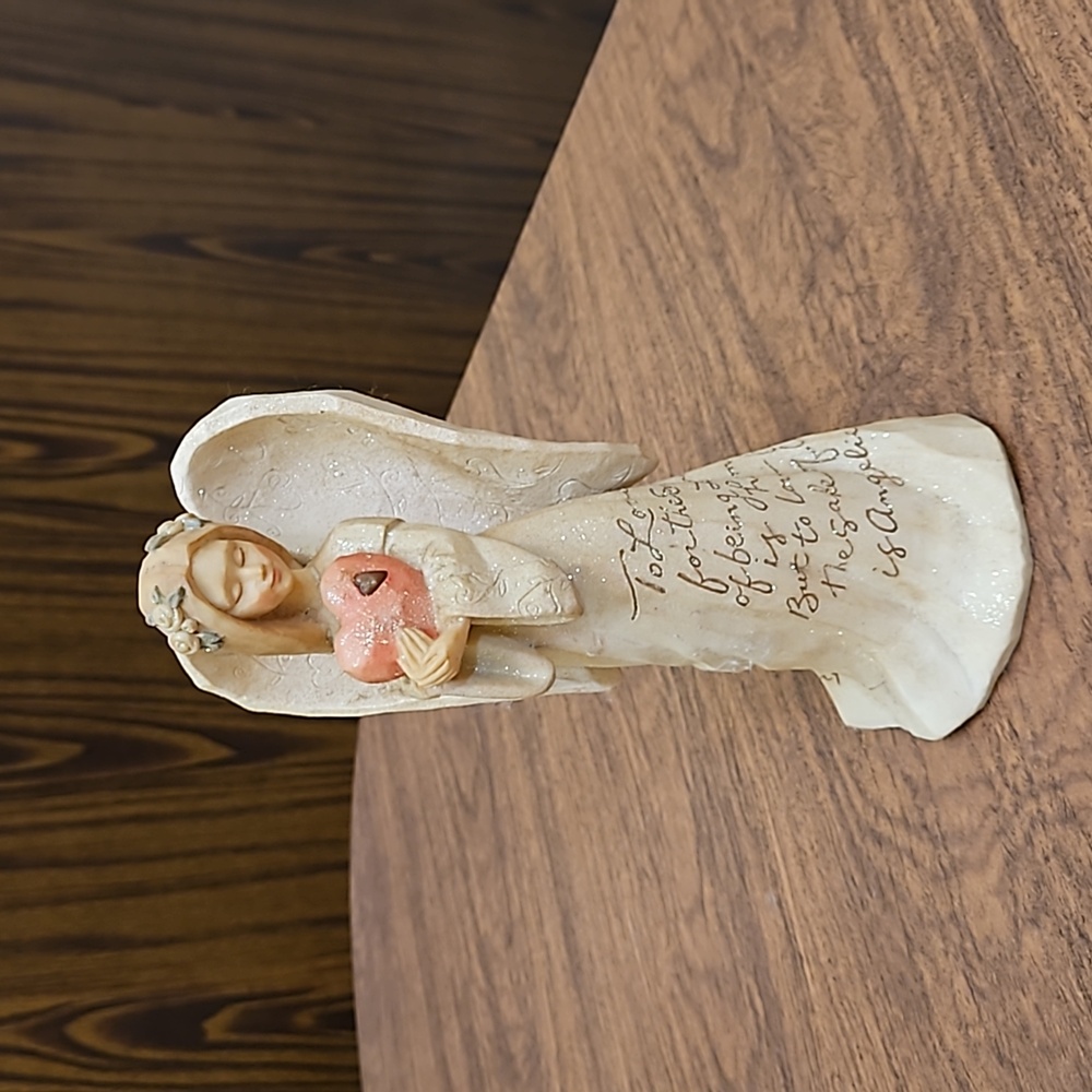 Enesco foundation's angel figurine 2002 collectible by Karen Hahn